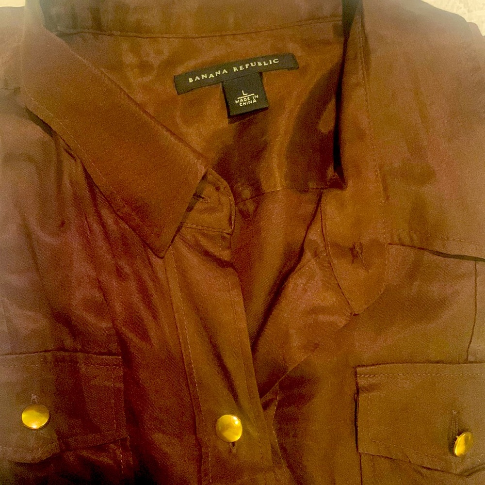 Brown soft silky long sleeve button down.  Gold buttons.